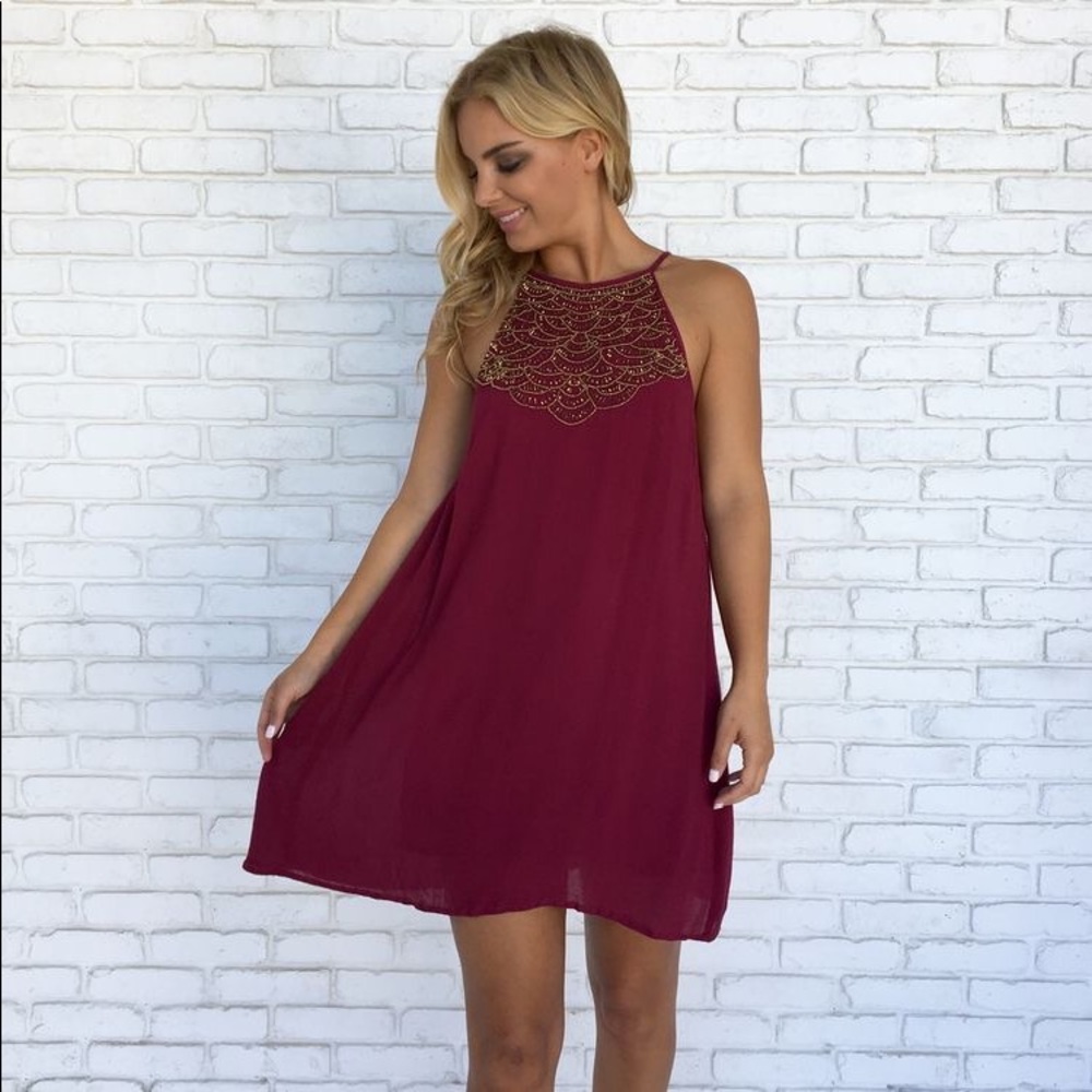 Orchestra Bead Halter Swing Mini Dress In Wine